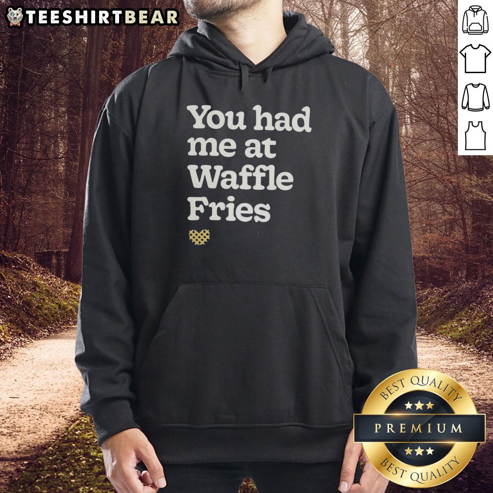 Cozy hoodie featuring 'You Had Me At Waffle Fries' text, perfect for fast food lovers and casual wear enthusiasts.
