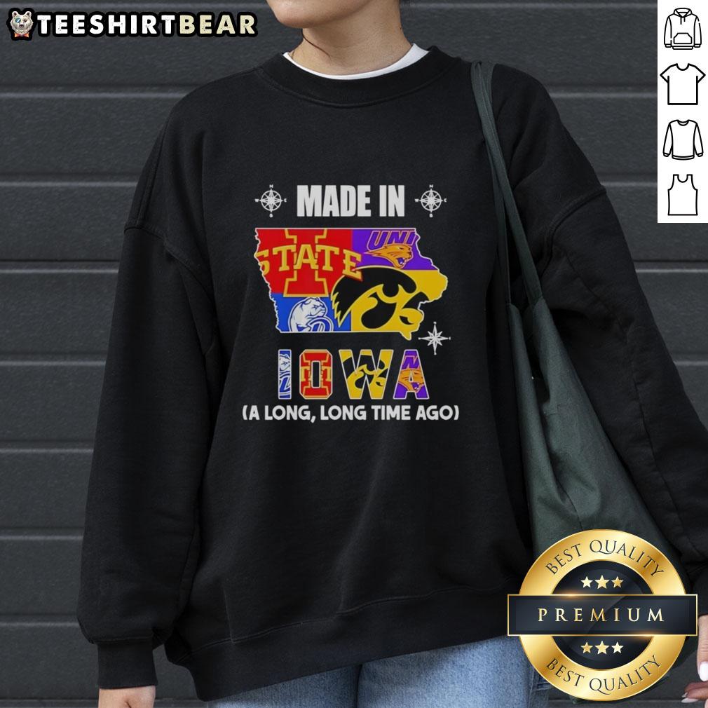 Alt Text: Official Made In Iowa sweatshirt featuring a retro mashup logo celebrating Iowa teams and culture, perfect for fans.