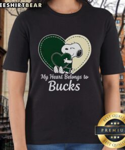 Alt Text: Official Milwaukee Bucks x Snoopy cartoon Valentine 2026 ladies tee featuring vibrant graphics and team logo.
