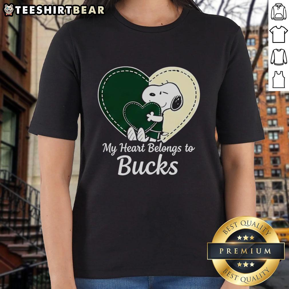 Alt Text: Official Milwaukee Bucks x Snoopy cartoon Valentine 2026 ladies tee featuring vibrant graphics and team logo.