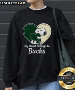 Official Milwaukee Bucks x Snoopy cartoon Valentine 2026 sweatshirt featuring vibrant graphics and team colors.
