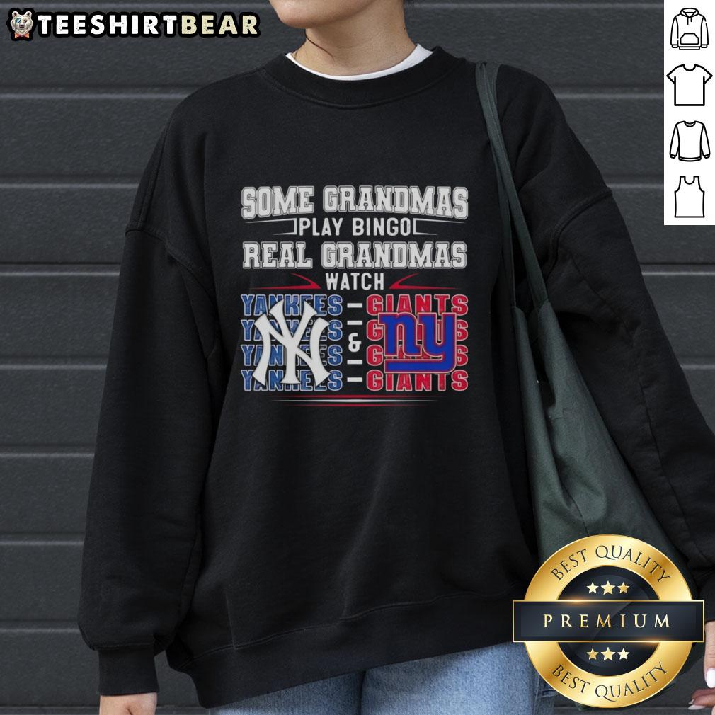 Official New York Yankees and New York Giants sweatshirt: 'Some Grandmas Play Bingo, Real Grandmas Watch' design.