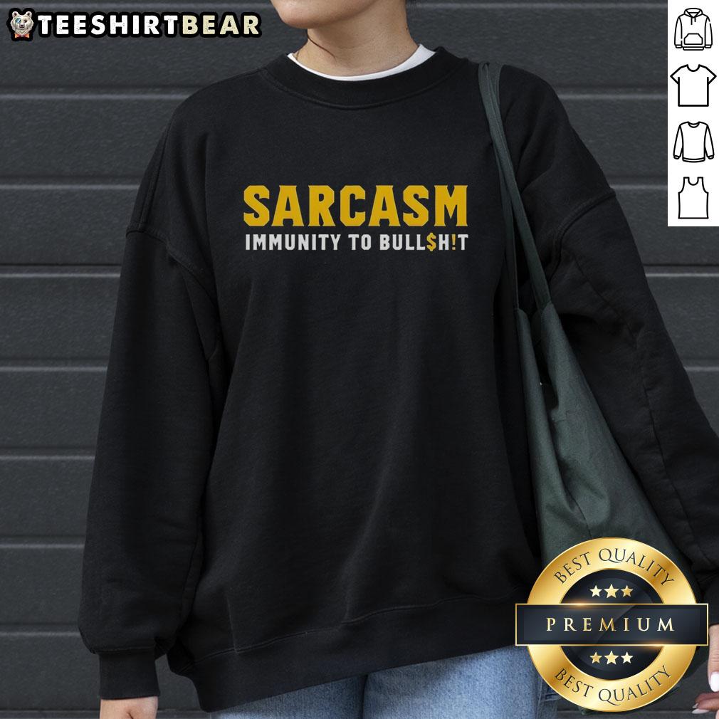Official Sarcasm Immunity to Bullshit Sweatshirt in black with bold white lettering, perfect for sarcasm lovers.