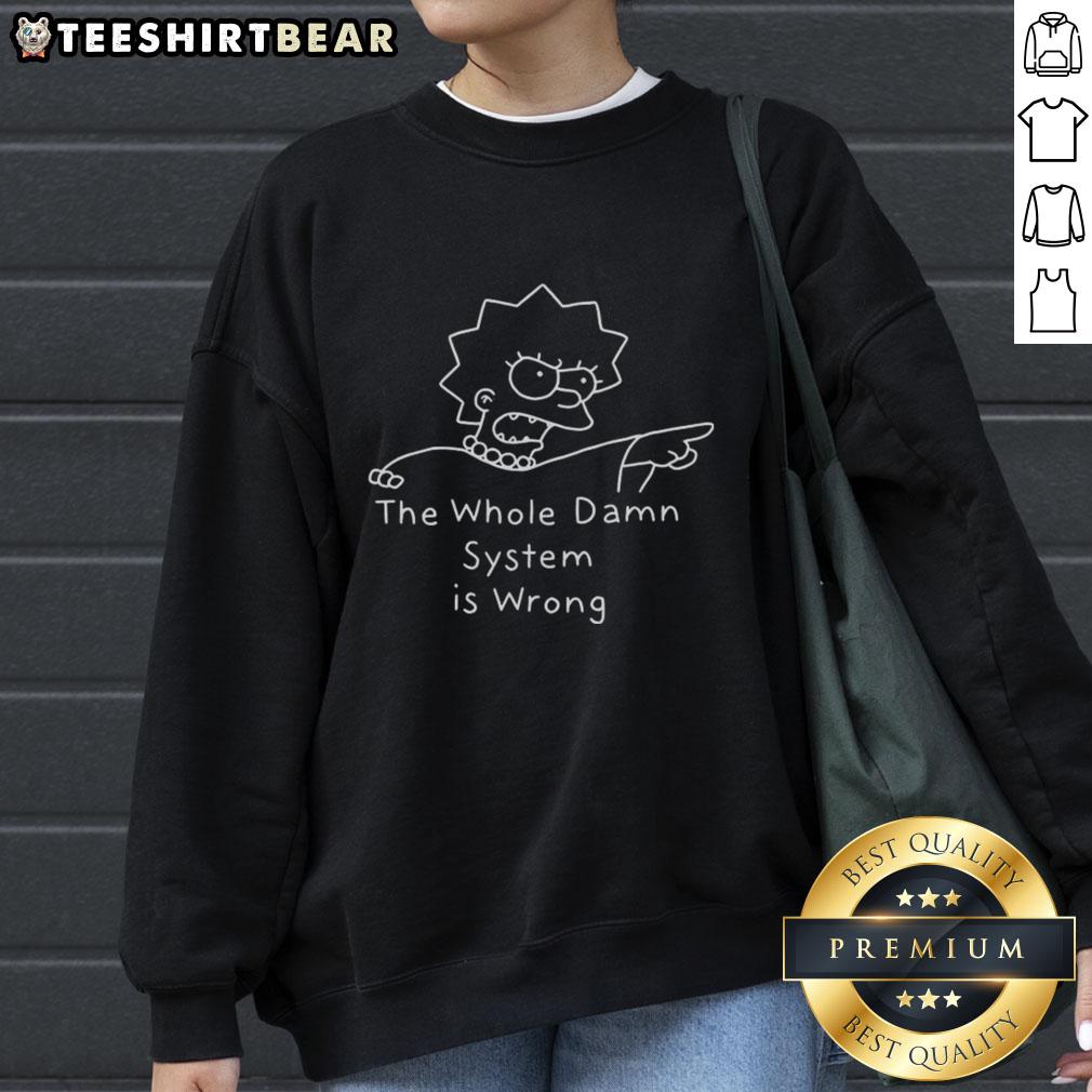 Alt Text: Cartoon character sketch from The Simpsons on a sweatshirt featuring the phrase The Whole Damn System Is Wrong.