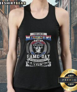 Original tank top featuring 'I May Live In Missouri But On Game Day My Heart Belongs To Las Vegas Raiders Football' design.