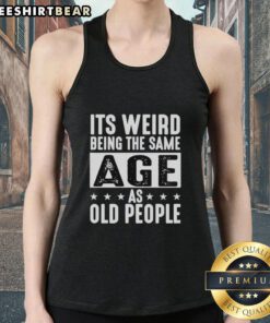 Vintage tank top featuring the phrase It's Weird Being The Same Age As Old People in a retro design. Perfect for casual wear.