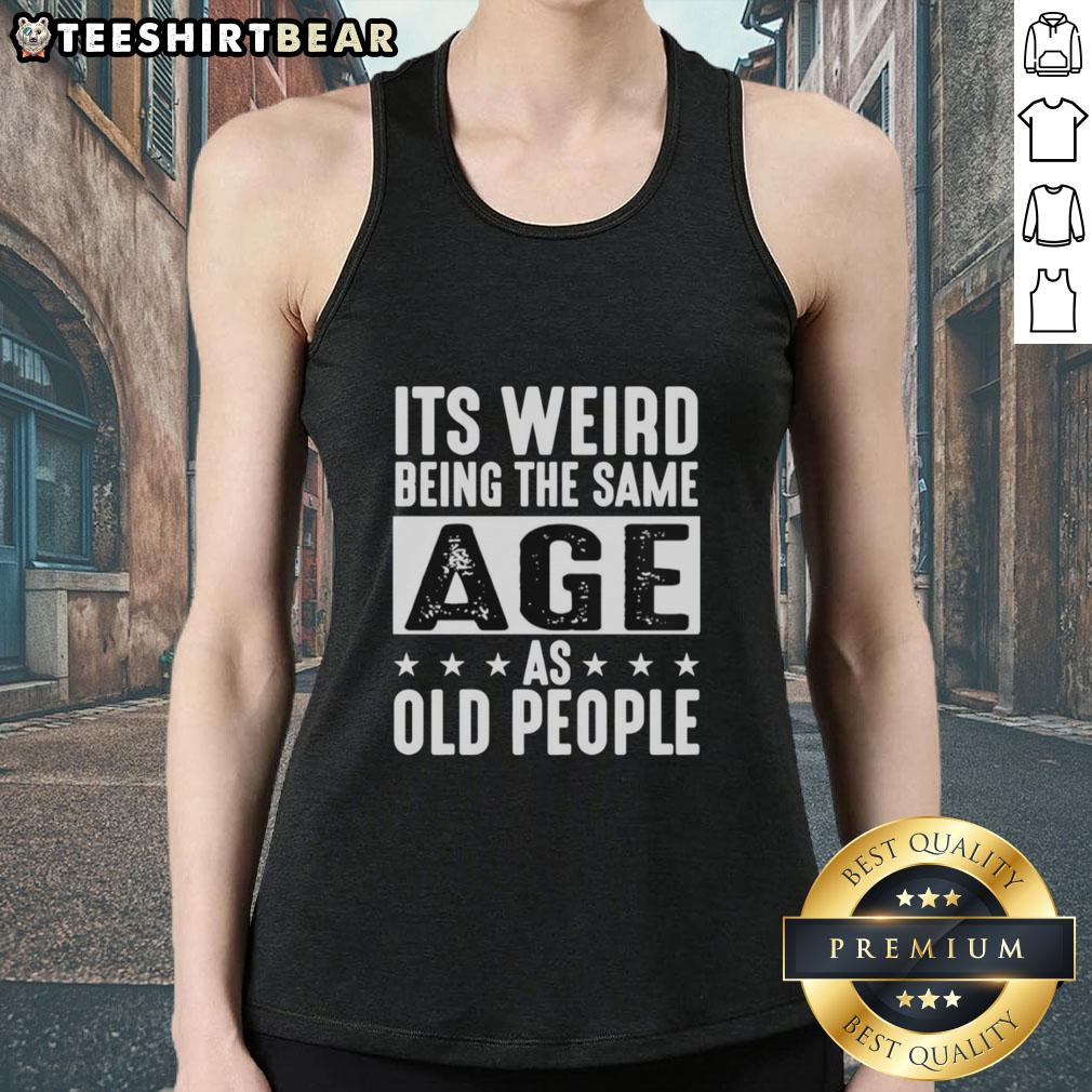 Vintage tank top featuring the phrase It's Weird Being The Same Age As Old People in a retro design. Perfect for casual wear.