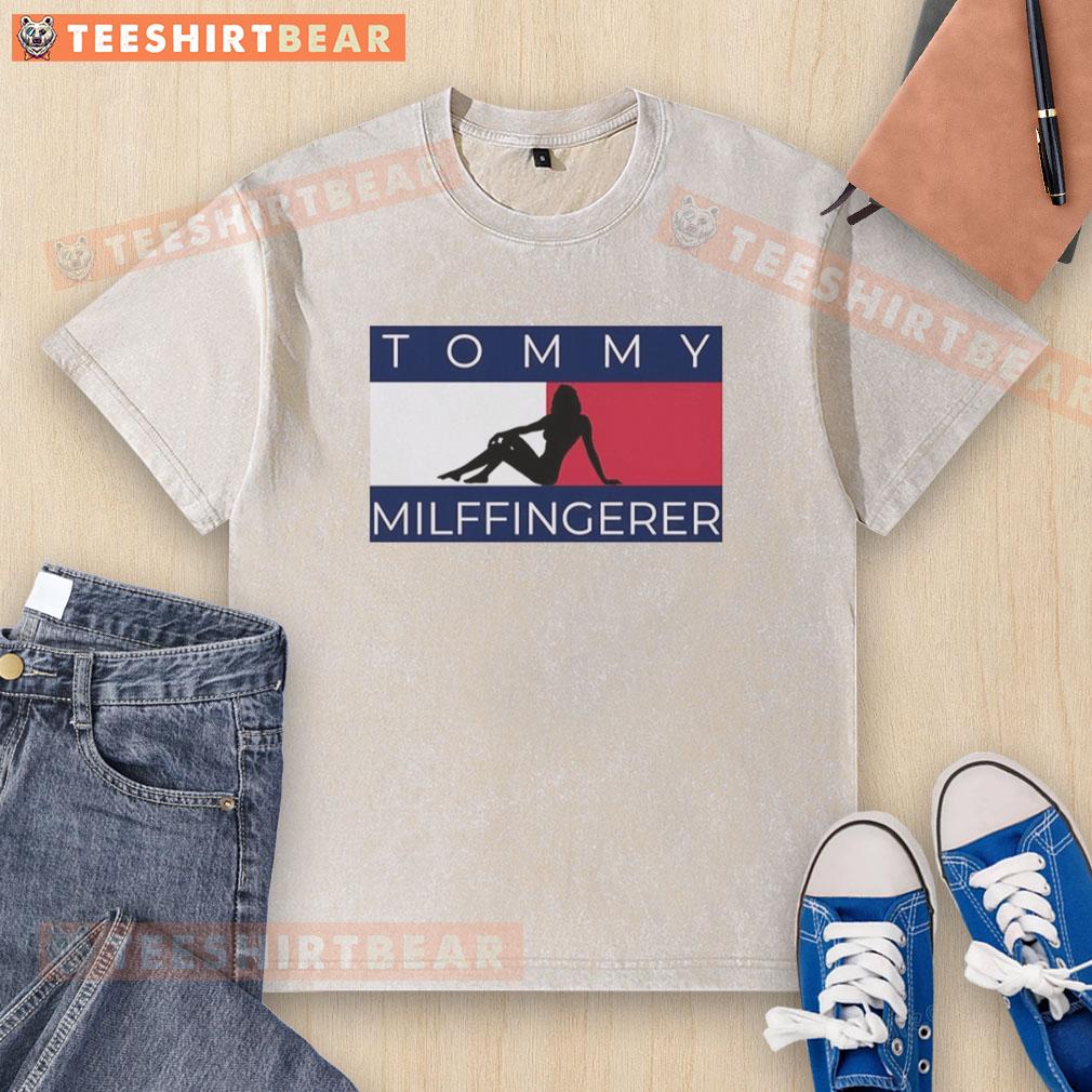 Alt Text: Original Shadow Girl Tommy Milffingerer logo on a washed t-shirt, showcasing a trendy and unique graphic design.