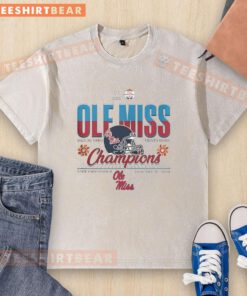Original Ole Miss Rebels 2026 Vrbo Fiesta Bowl Champions football helmet washed t-shirt displayed at State Farm Stadium.