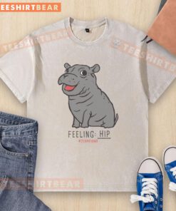 Alt Text: Premium Fiona the Hippo Feeling Hip Washed T-Shirt in light blue, featuring a playful hippo graphic design.
