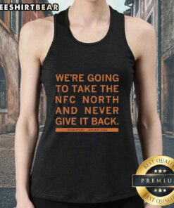 Ryan Poles wearing a tank top with 'We're Going to Take the NFC North' slogan, January 2022, showcasing team pride.