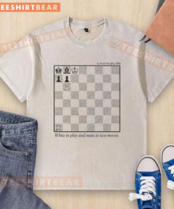 Alt Text: Premium white chess-themed T-shirt featuring 'Play and Mate in Two Moves 1856' design on a chessboard backdrop.