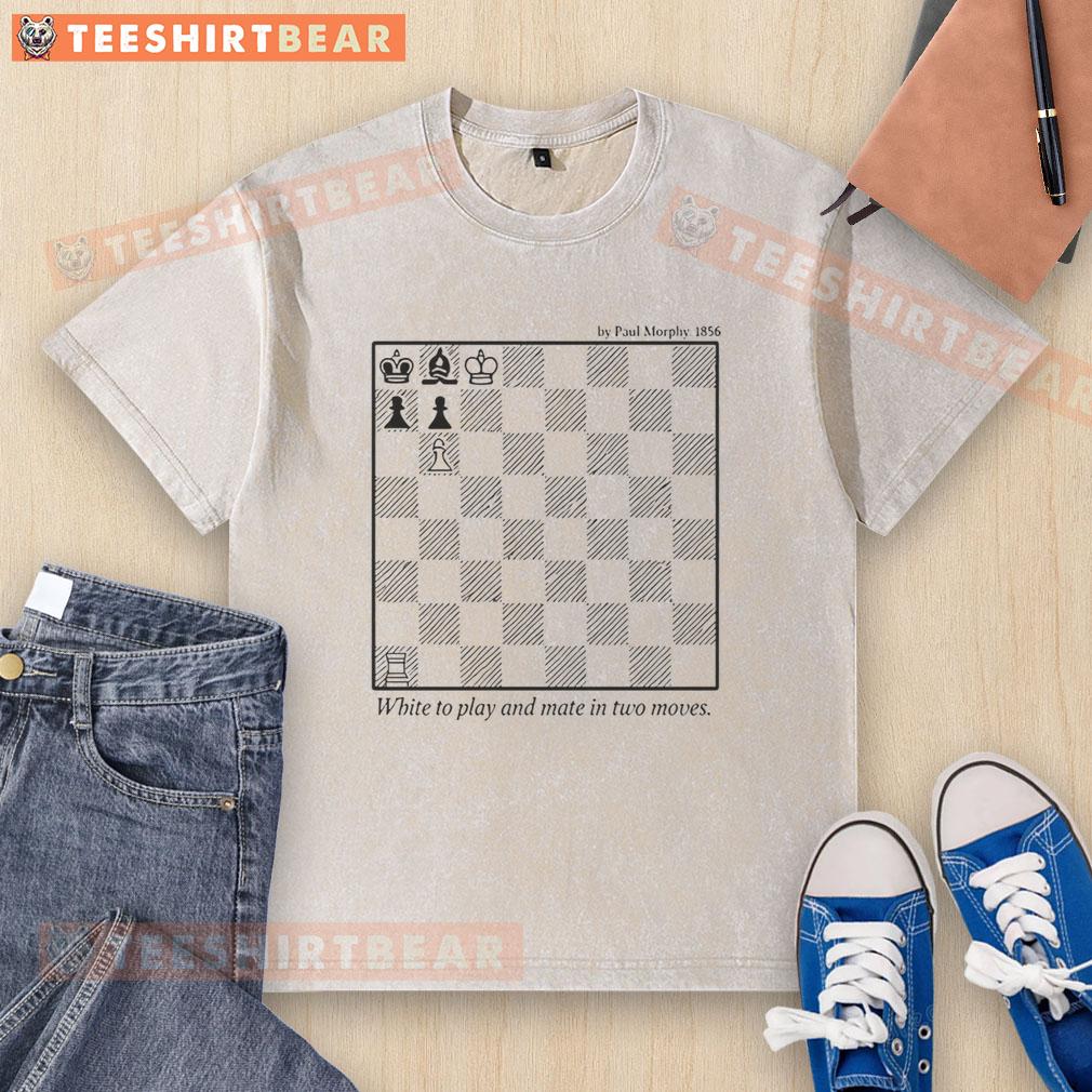 Alt Text: Premium white chess-themed T-shirt featuring 'Play and Mate in Two Moves 1856' design on a chessboard backdrop.