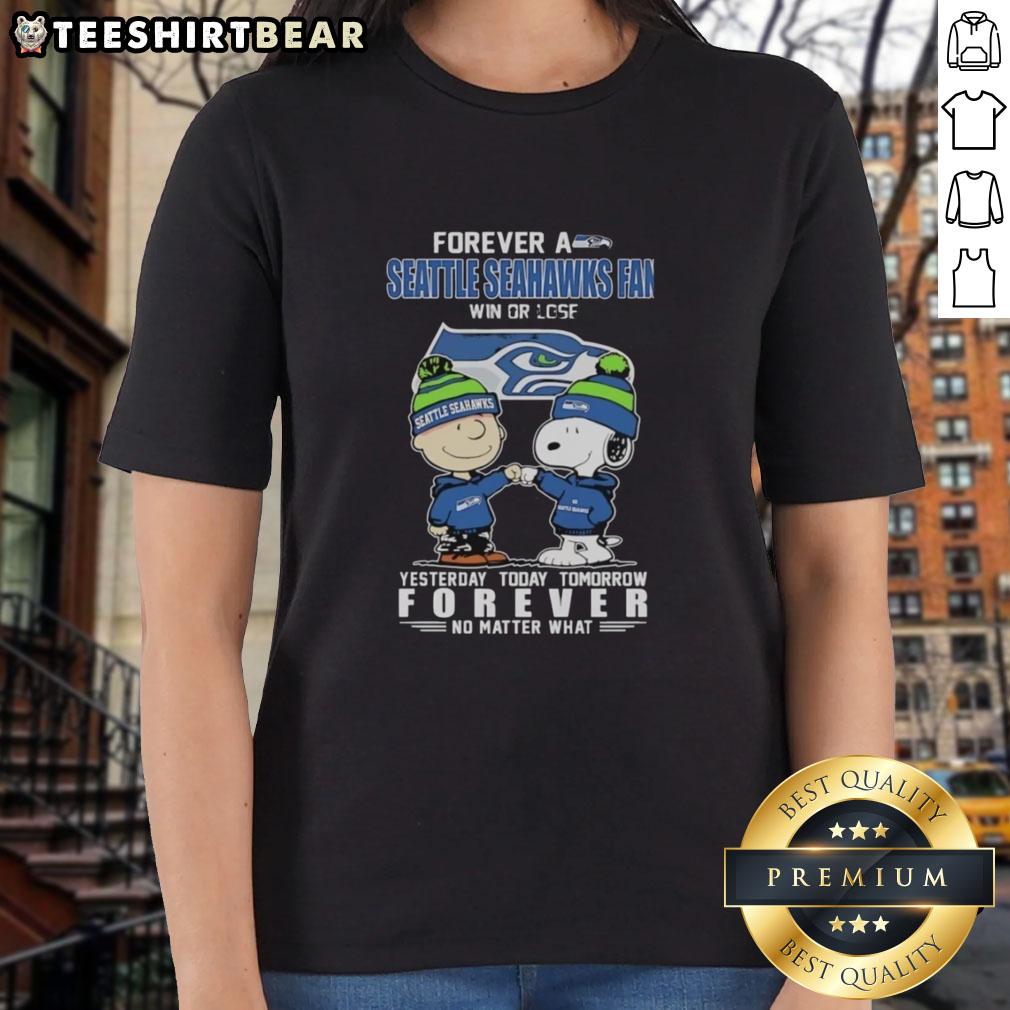 Alt Text: Pretty Charlie Brown fist bump with Snoopy, celebrating Seattle Seahawks fan spirit in a ladies tee design.