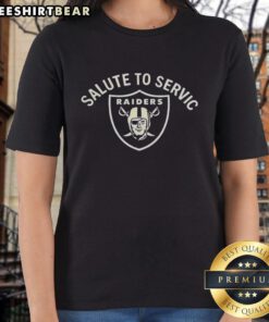 Pretty Coach Pete Carroll Las Vegas Raiders NFL Salute to Service logo on a ladies tee shirt.