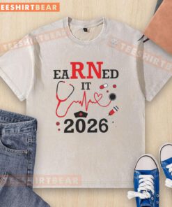 Alt Text: Pretty Earned It RN Registered Nurse 2026 washed t-shirt featuring a stylish design for proud nurses.