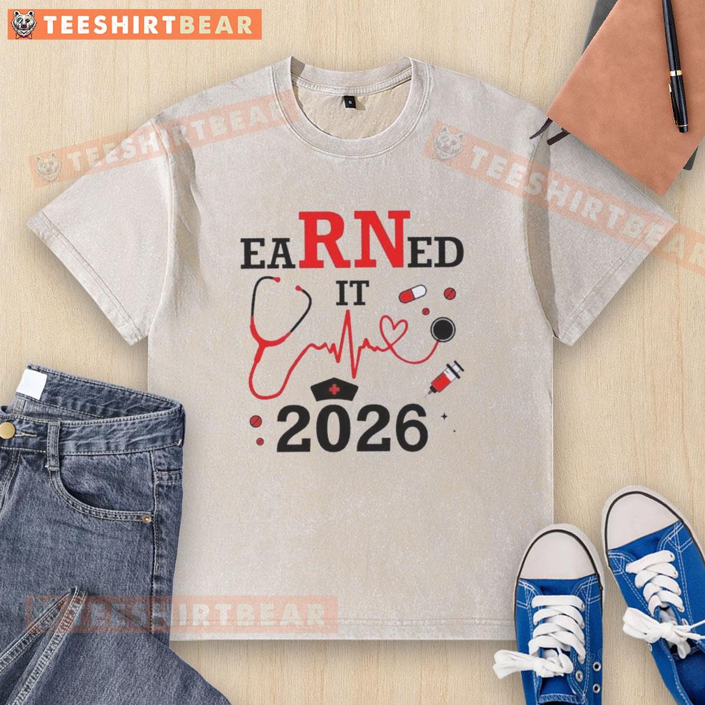Alt Text: Pretty Earned It RN Registered Nurse 2026 washed t-shirt featuring a stylish design for proud nurses.