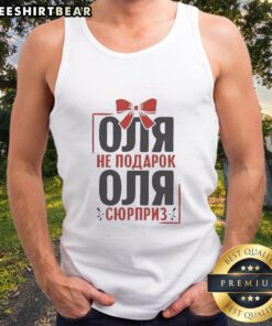 Alt Text: Pretty Olga in a vibrant Russian outfit, showcasing a stylish tank top perfect for Russians, exuding cultural charm.