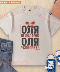 Olga in a traditional Russian outfit, smiling while wearing a washed t-shirt, showcasing cultural fashion for Russians.