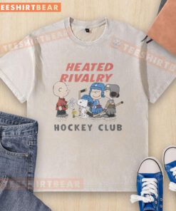 Pretty Peanuts characters in a heated rivalry, featured on a stylish hockey club washed t-shirt design.
