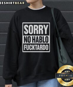 Trendy Pretty Sorry No Hablo Fcktardo sweatshirt displayed on a hanger, showcasing a stylish design for casual wear.