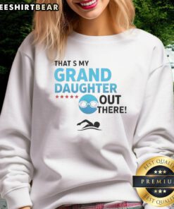Granddaughter wearing a stylish sweatshirt that says 'Pretty, That's My Granddaughter Out There' at a sunny park.