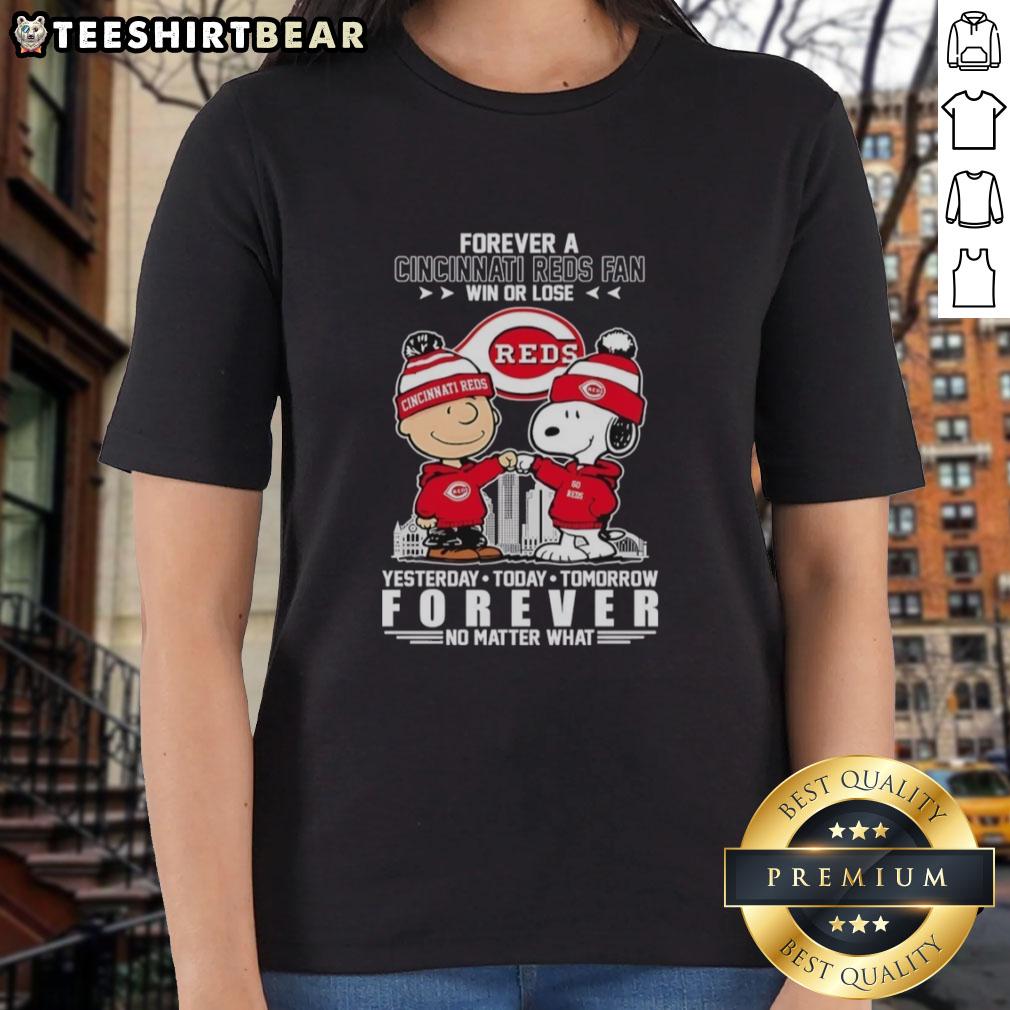 Alt Text: Top Charlie Brown fist bump with Snoopy in Cincinnati Reds fan tee, celebrating loyalty win or lose.