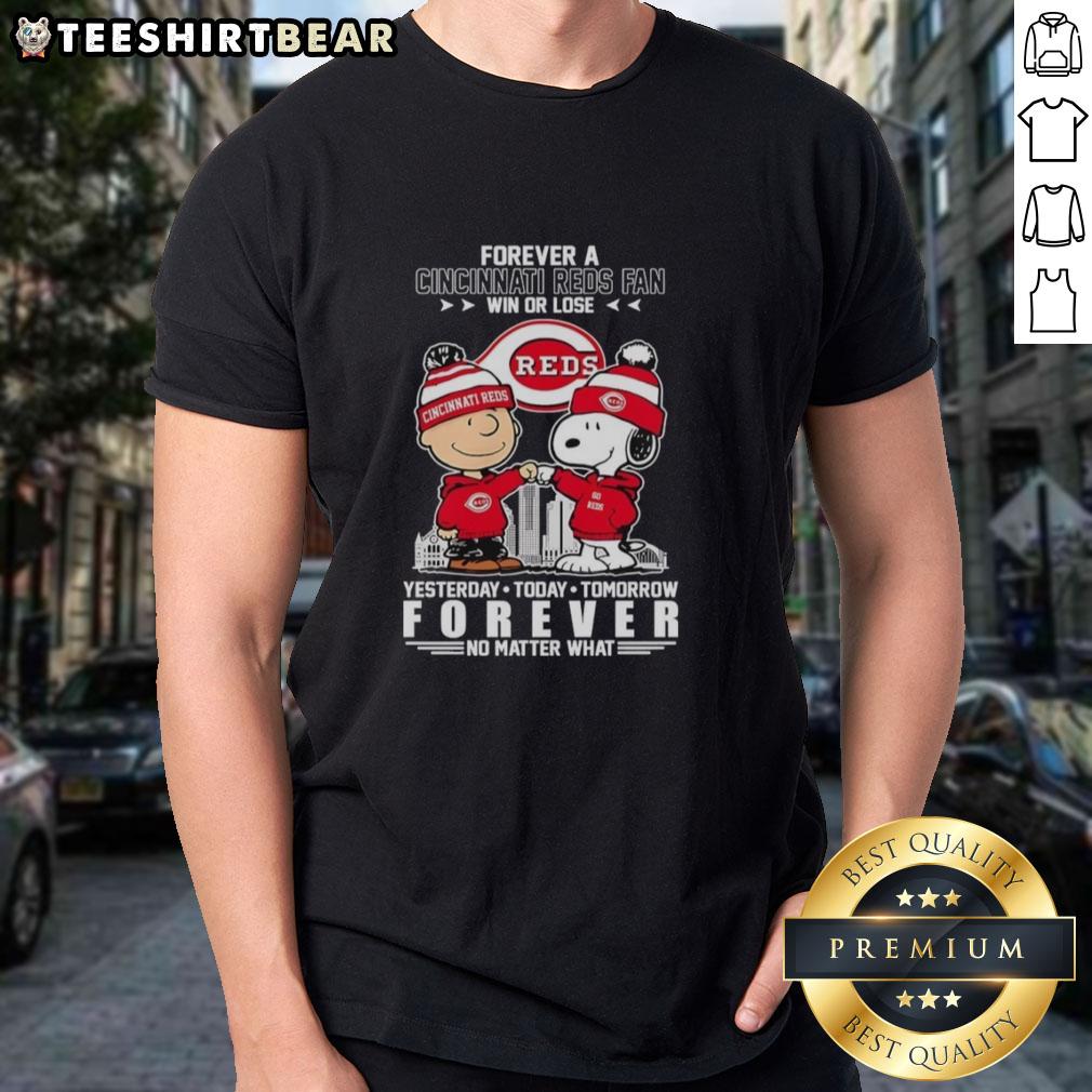 Charlie Brown and Snoopy fist bump on a Cincinnati Reds fan t-shirt, celebrating loyalty win or lose.