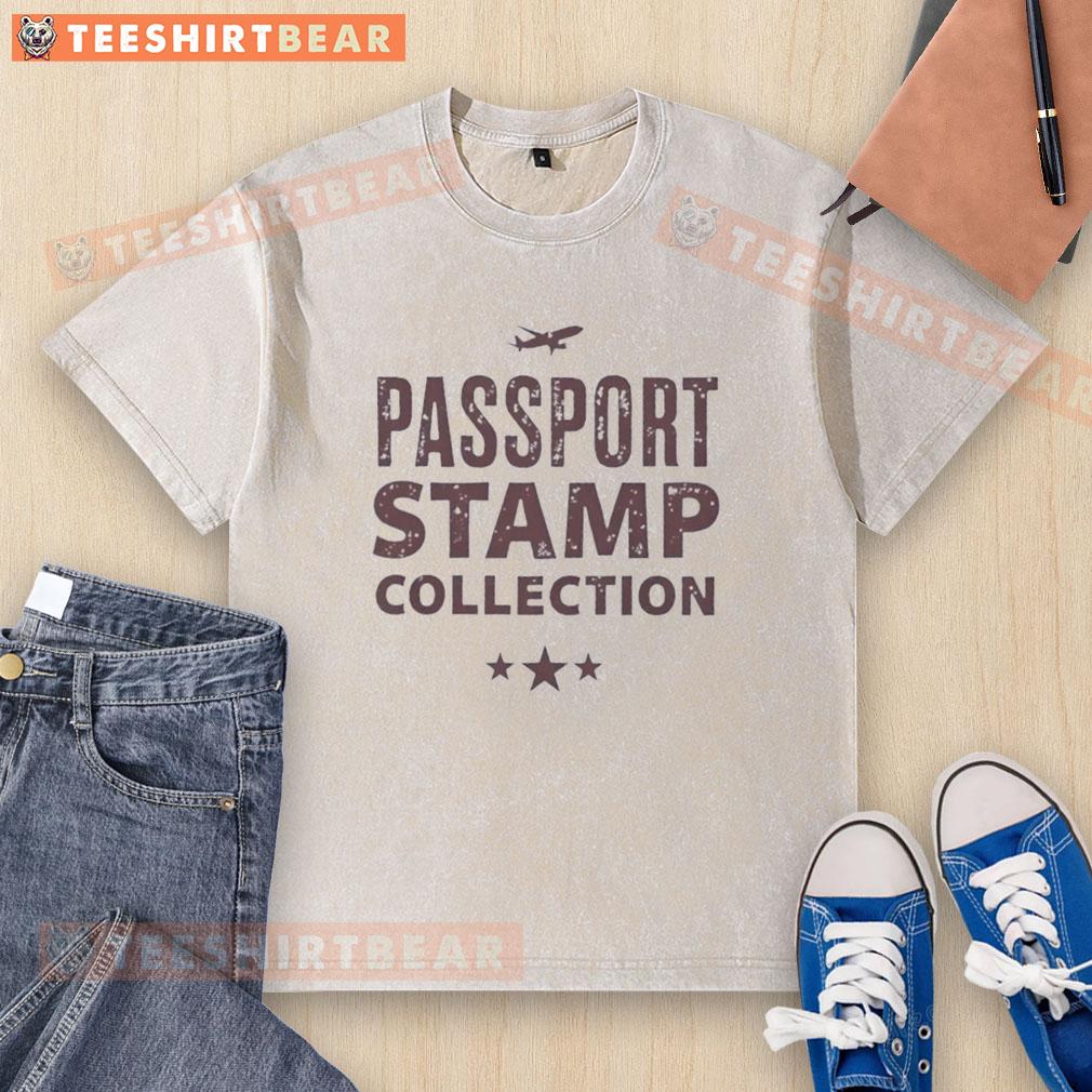 Unique washed t-shirt featuring a vibrant top passport stamp collection design, perfect for travel enthusiasts.