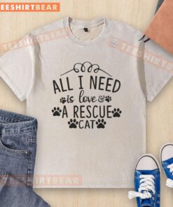 Awesome All I Need Is Love A Rescue Cat washed t-shirt featuring a cute cat graphic, perfect for cat lovers.