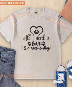 Awesome All I Need Is Love A Rescue Dog washed t-shirt design featuring a playful dog graphic and vibrant colors.