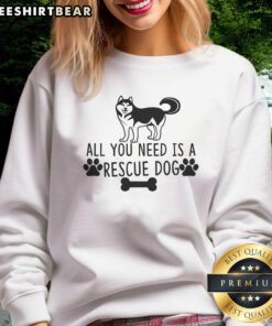 Alt Text: Cozy 'All You Need Is A Rescue Dog' sweatshirt featuring a cute dog graphic, perfect for dog lovers and pet advocates.