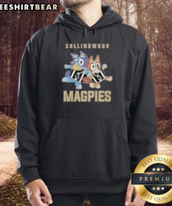 Alt Text: Bluey and Bingo wearing a Collingwood Magpies hoodie, showcasing their awesome style and team spirit.