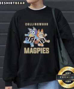 Alt Text: Awesome Bluey and Bingo in Collingwood Magpies sweatshirt, showcasing a fun and stylish kids' outfit for fans.