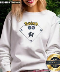 Awesome Miami Marlins X Pokemon Team Valor Sweatshirt featuring vibrant graphics and a stylish design for fans.