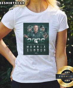 Alt Text: Michigan State Spartans football NCAA 2026 regular season schedule poster on a ladies tee shirt design.