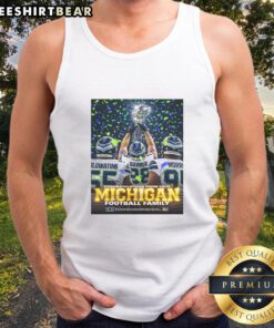 Alt Text: Awesome Oluwatimi Barner Morr celebrates with trophy in Seattle Seahawks gear and Michigan tank top. Congrats!