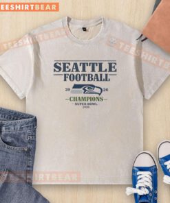 Alt Text: Awesome Seattle Seahawks Football Super Bowl Champions 2026 logo on a washed t-shirt, perfect for fans.