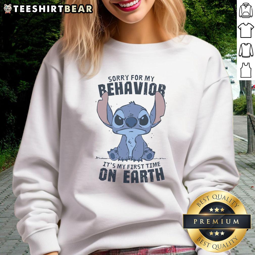 Adorable 'Sorry For My Behavior It's My First Time On Earth' Stitch sweatshirt featuring vibrant colors and a playful design.
