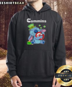 Alt Text: Cute Stitch wearing a St. Patrick's-themed hoodie with Cummins logo, perfect for festive celebrations.