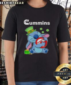 Adorable Stitch character with St. Patrick's Day hug, featuring Cummins logo on a ladies tee shirt.