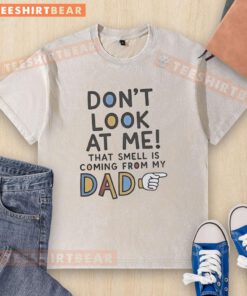 Alt Text: Funny 'Don't Look At Me, That Smell Is Coming From My Dad' washed T-shirt featuring humorous typography design.