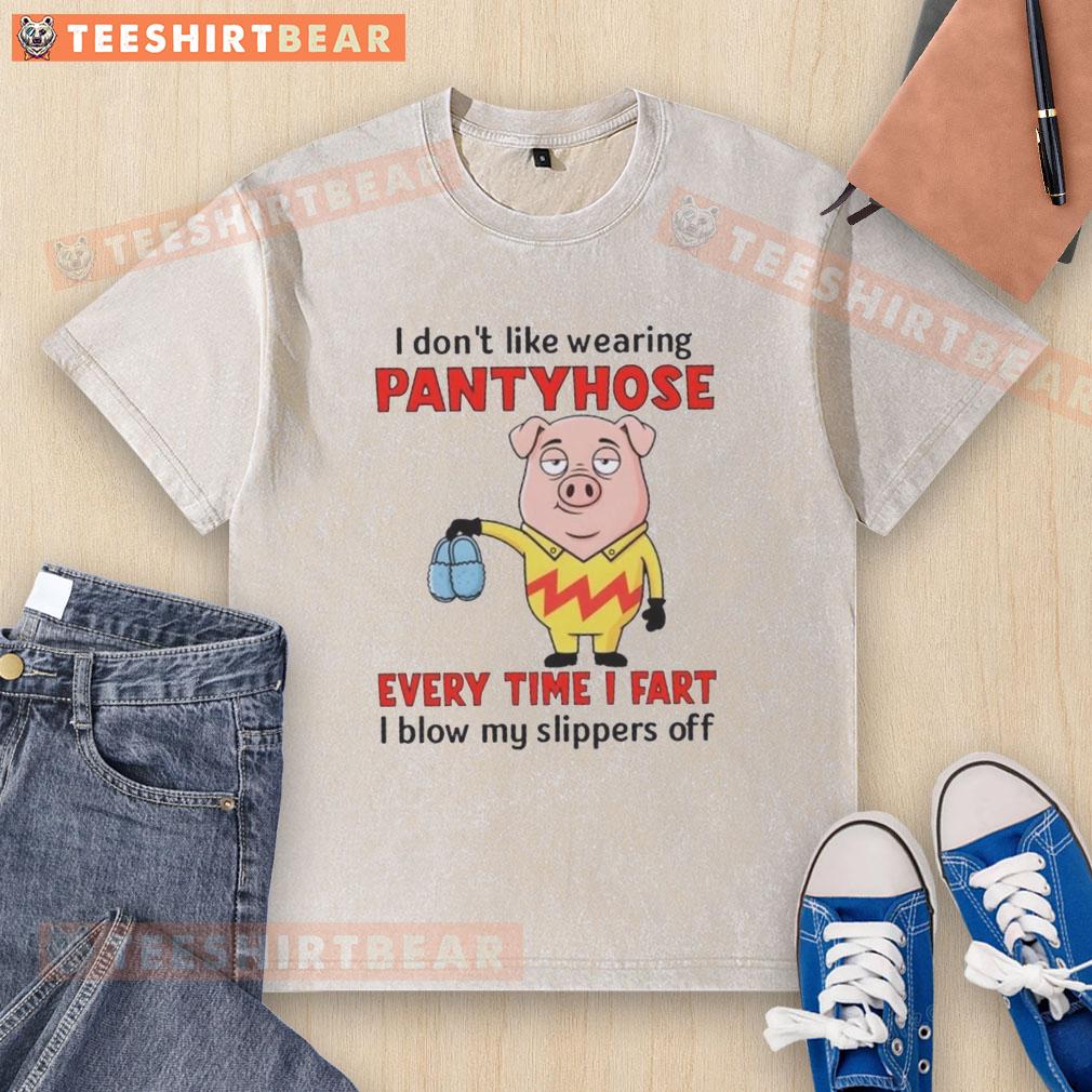 Funny pig in a washed T-shirt, expressing dislike for pantyhose, humorously stating every fart blows off its slippers.