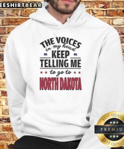 Funny hoodie featuring the phrase 'The Voices In My Head Keep Telling Me To Go To North Dakota' for quirky style.