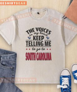 Funny washed T-shirt featuring the phrase 'The voices in my head keep telling me to go to South Carolina.'