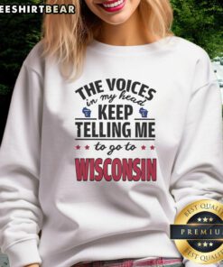 Funny sweatshirt reading 'The Voices In My Head Keep Telling Me To Go To Wisconsin' perfect for humor lovers.