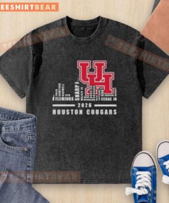Alt Text: 2026 Houston Cougars football washed t-shirt featuring city skyline design and team names, perfect for fans.