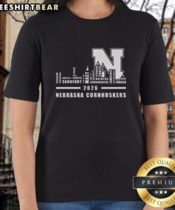 Good 2026 Nebraska Cornhuskers Ladies Tee featuring city skyline design and all names for fans of Nebraska football.