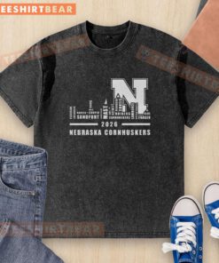 Alt Text: Good 2026 Nebraska Cornhuskers all names city skyline washed t-shirt showcasing team spirit and local pride.