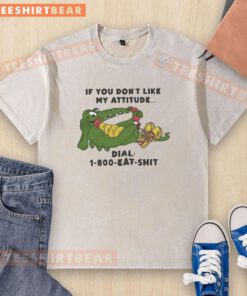 Funny washed t-shirt featuring a good alligator and the phrase 'If you don't like my attitude, dial 1-800-EAT-SHT'.
